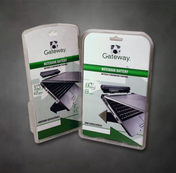 Two Gateway notebook battery retail packages with green accents on a dark background